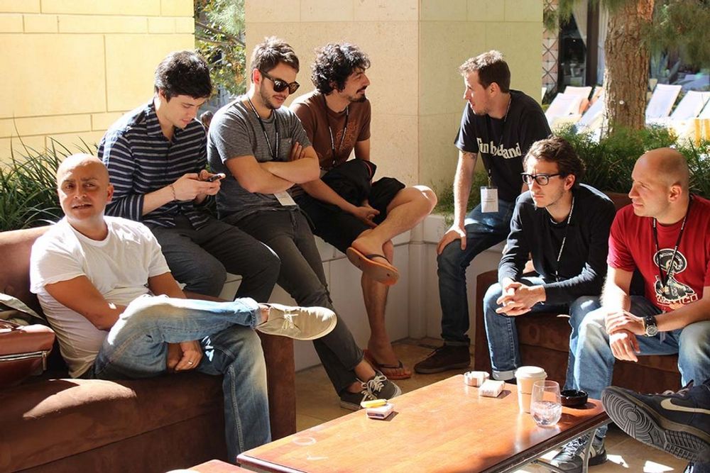 Amir Kassaei on the patio with several young creatives: Marcelo Tolentino , Renato Zandona, Fernando Calvache, Marcelo Bruzzesi, Alexandre Girod, Julian Alberto, and Gutierrez Vega