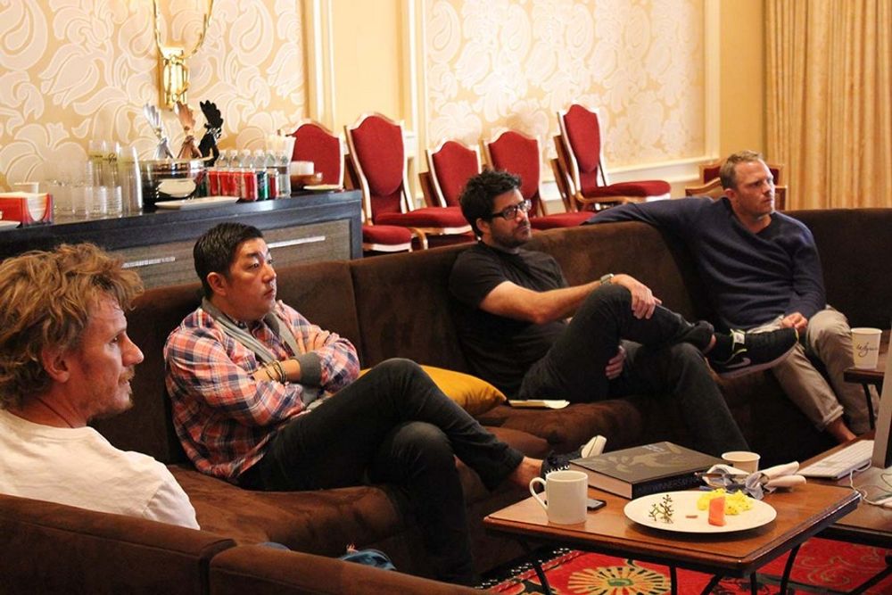 Nick Law, Naoki Ito, Brendan DiBona, and Andreas Ullenius in the judging room