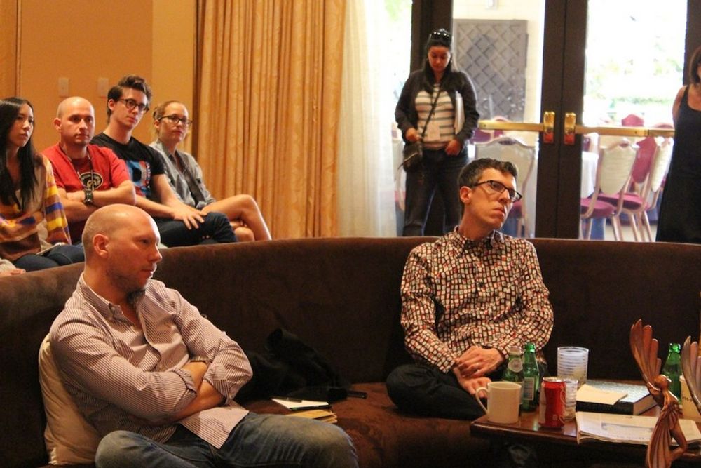 Philip Ahlqwist and Christian Haas in statue discussions, while young creatives Kar-Kate Leung, Julian Alberto Gutierrez Vega, Psembi Kinstan, and Philippa Groom enjoy sitting in on the discussion