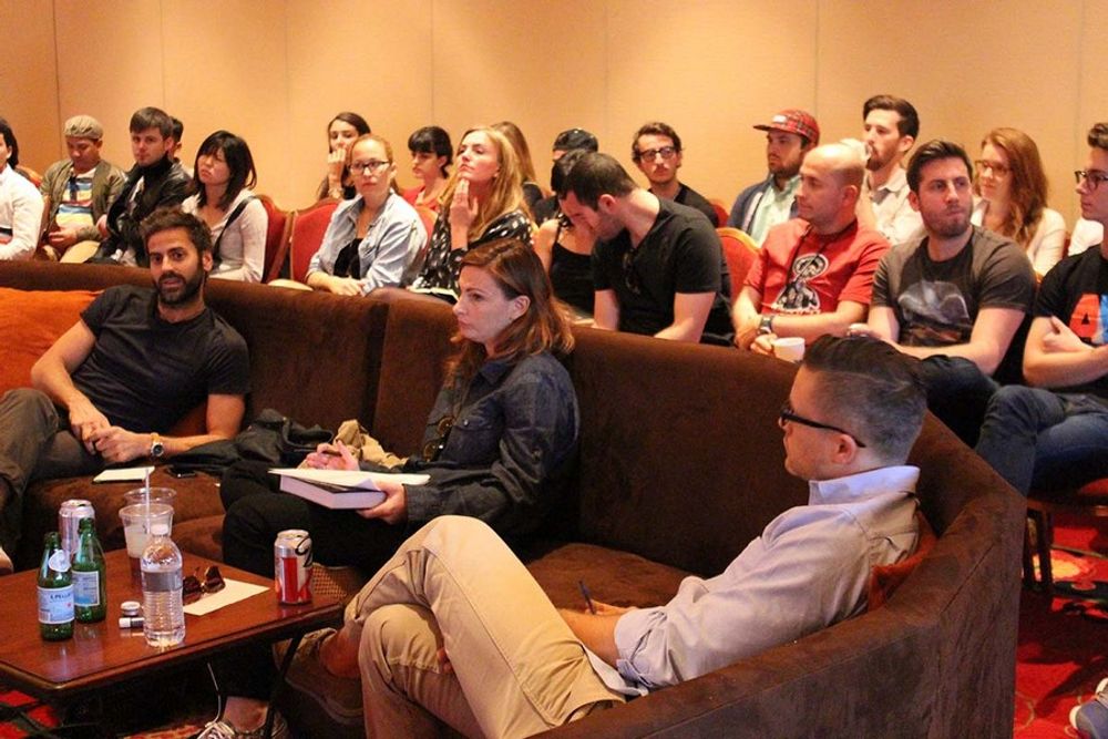 David Leinheardt, Jessica Dierauer and Jack Sedgwick having a great time in discussions, while the young creatives sit in