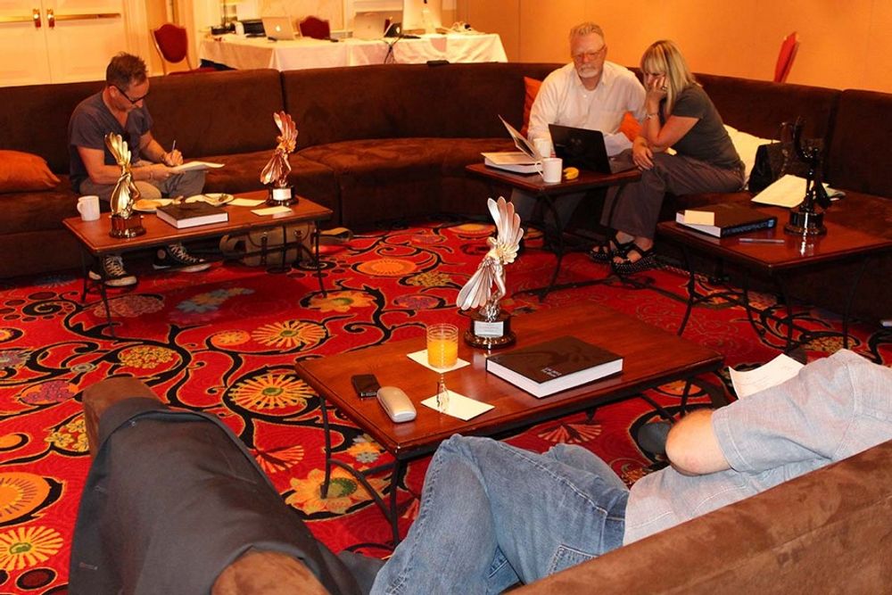 Michael Ritchie, Jonathon Ker and Laura Gregory working hard in the judging room