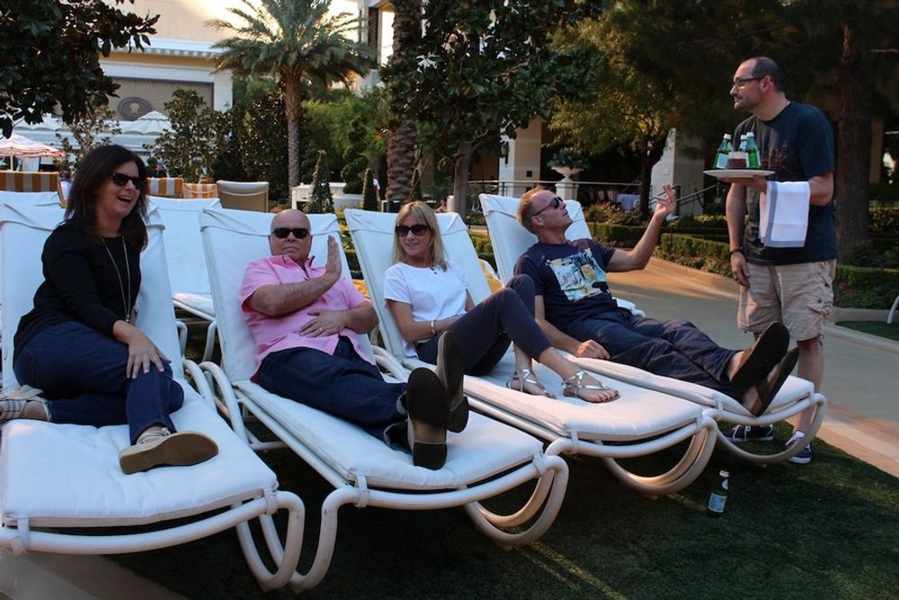 Jill Cheris, Terry O'Reilly, Jill McCrostie, Ralph van Dijk, and Chris Smith getting creative, while taking a break outside by the pool