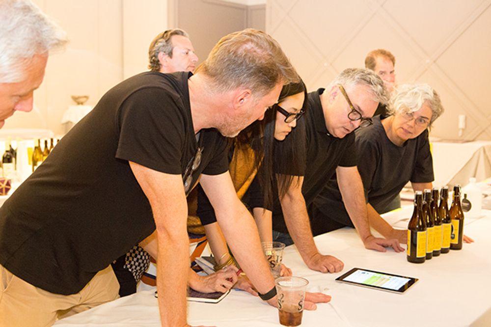 Design & Package Design Jury looking at the work