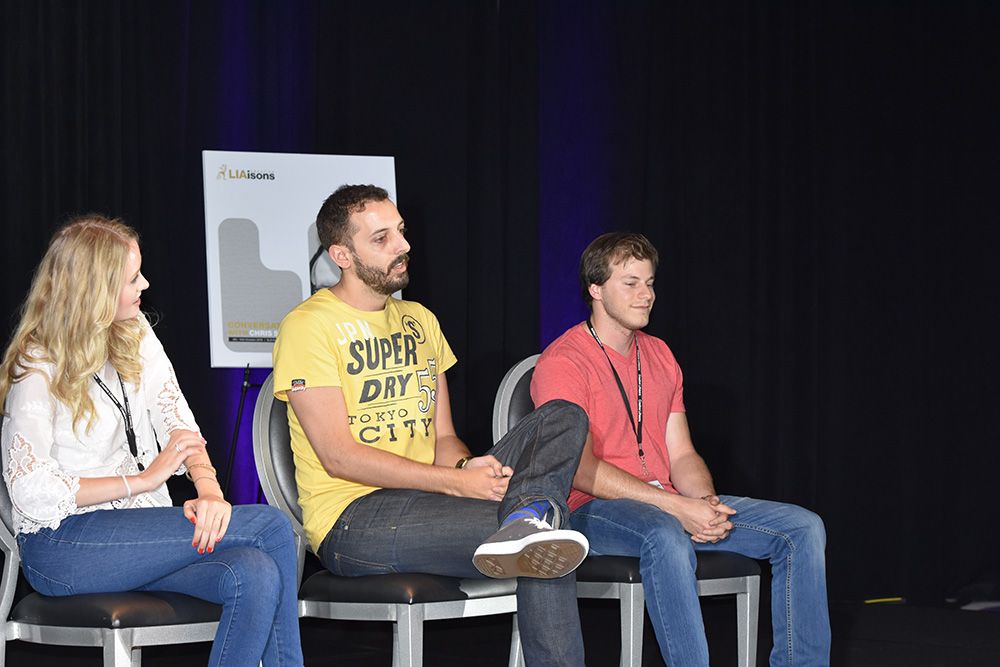 Celia Nelson, Marty Hoefkes and Johnny Michael volunteer during Chris Smith's talk
