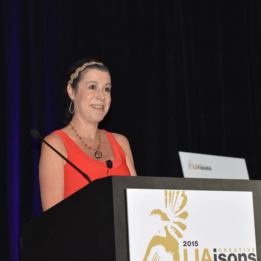 Faith Wall speaking at Creative LIAisons