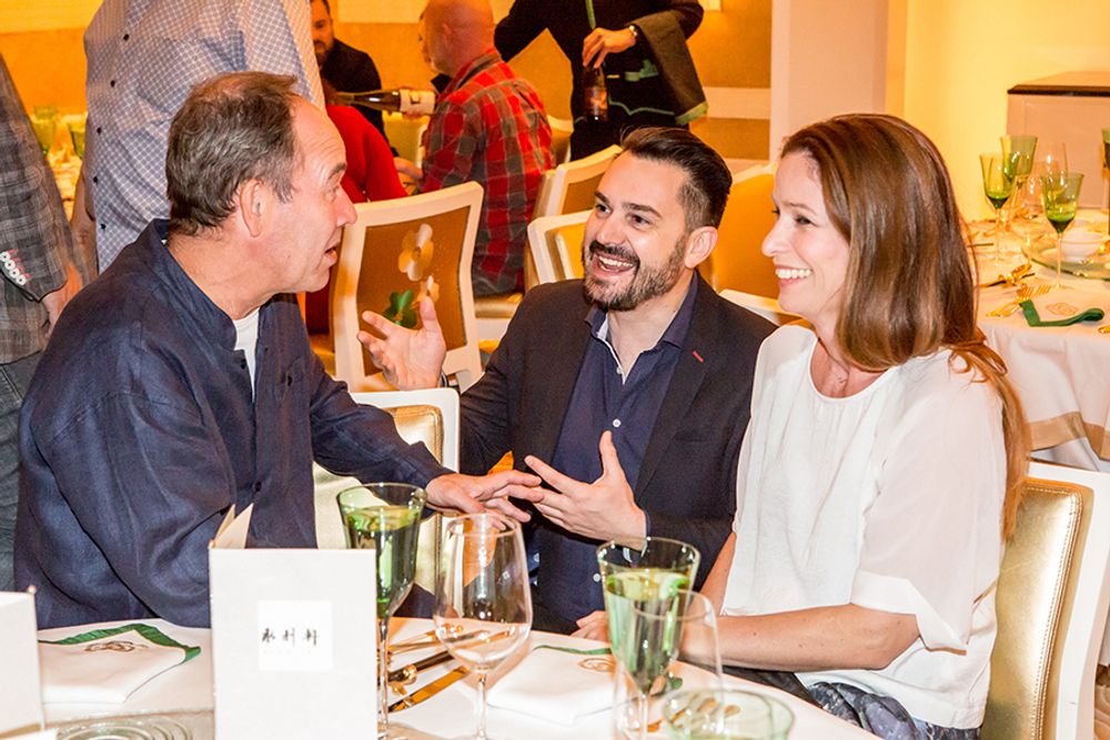 Jeremy Craigen and Adrian Bosich conversing at Wing Lei jury dinner