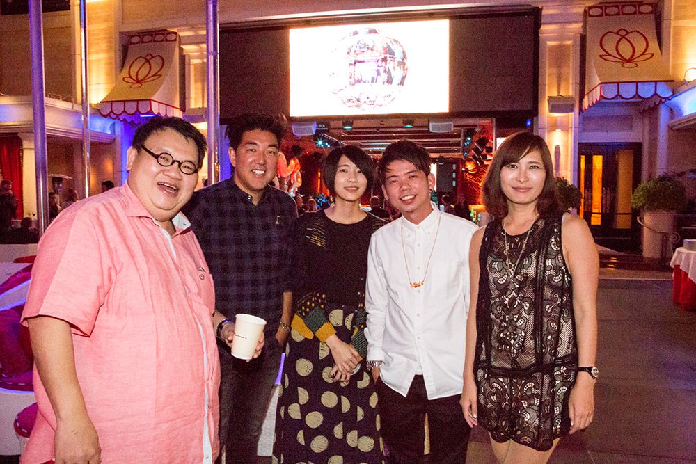 Gordon Tan and Akiko Suenaga with young creatives at the LIA Judges & Creative LIAisons party