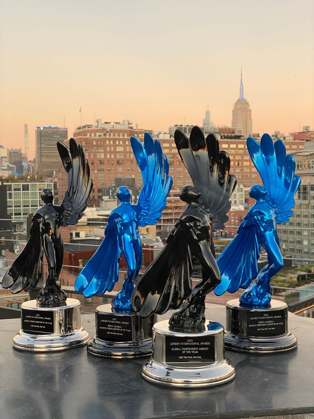 L&C Receives their statues for Global Independent Agency of the Year, Global Design Agency of the Year, Best Independent Agency in North America, Best Design Agency in North America