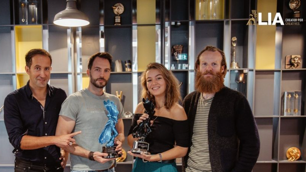 The Mill Accepting their Awards